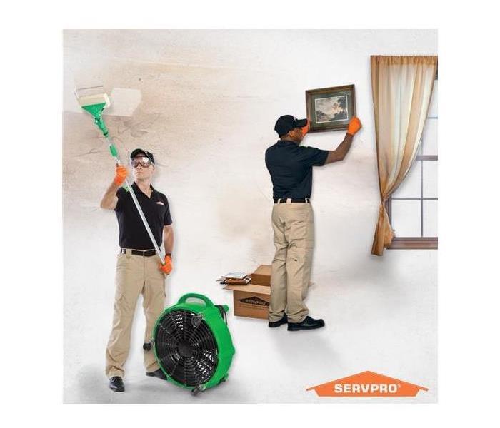 SERVPRO technicians cleaning a room from fire